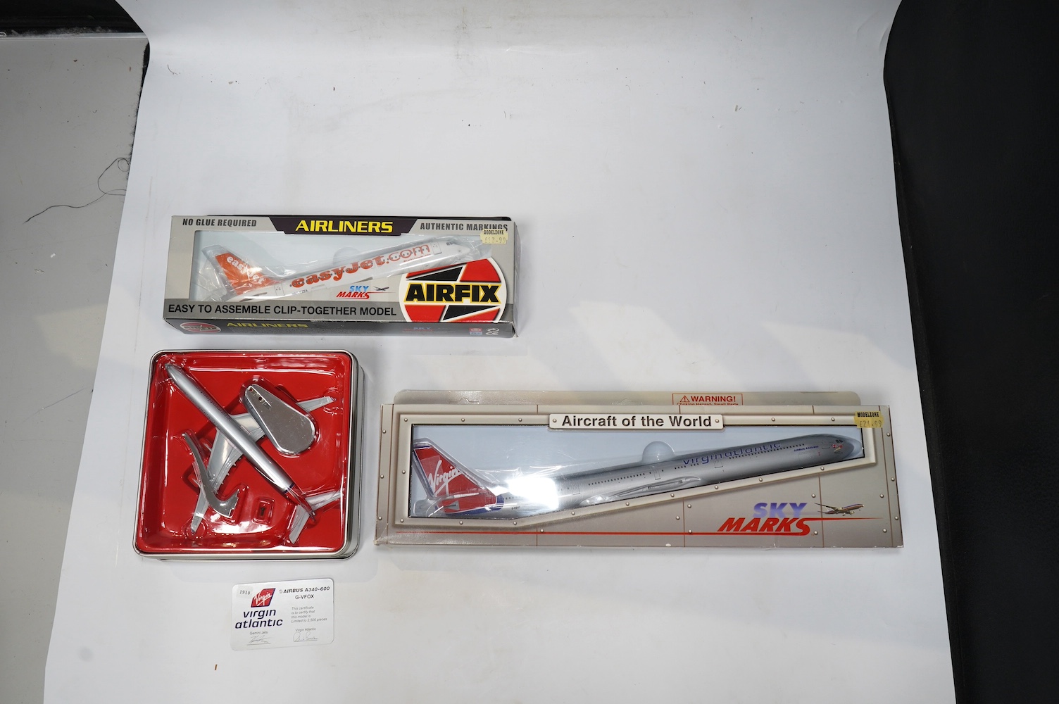 Forty-four boxed models of modern passenger aircraft by Gemini Jets, Airfix, Sky Marks, etc. in a variety of scales including 1:400, 1:200, etc. operators include British Airways, Vietnam Airlines, Virgin Atlantic, etc.